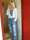 Spodnie jeans Boyfriend przetarcia i srebrnym elementem na dole nogawki